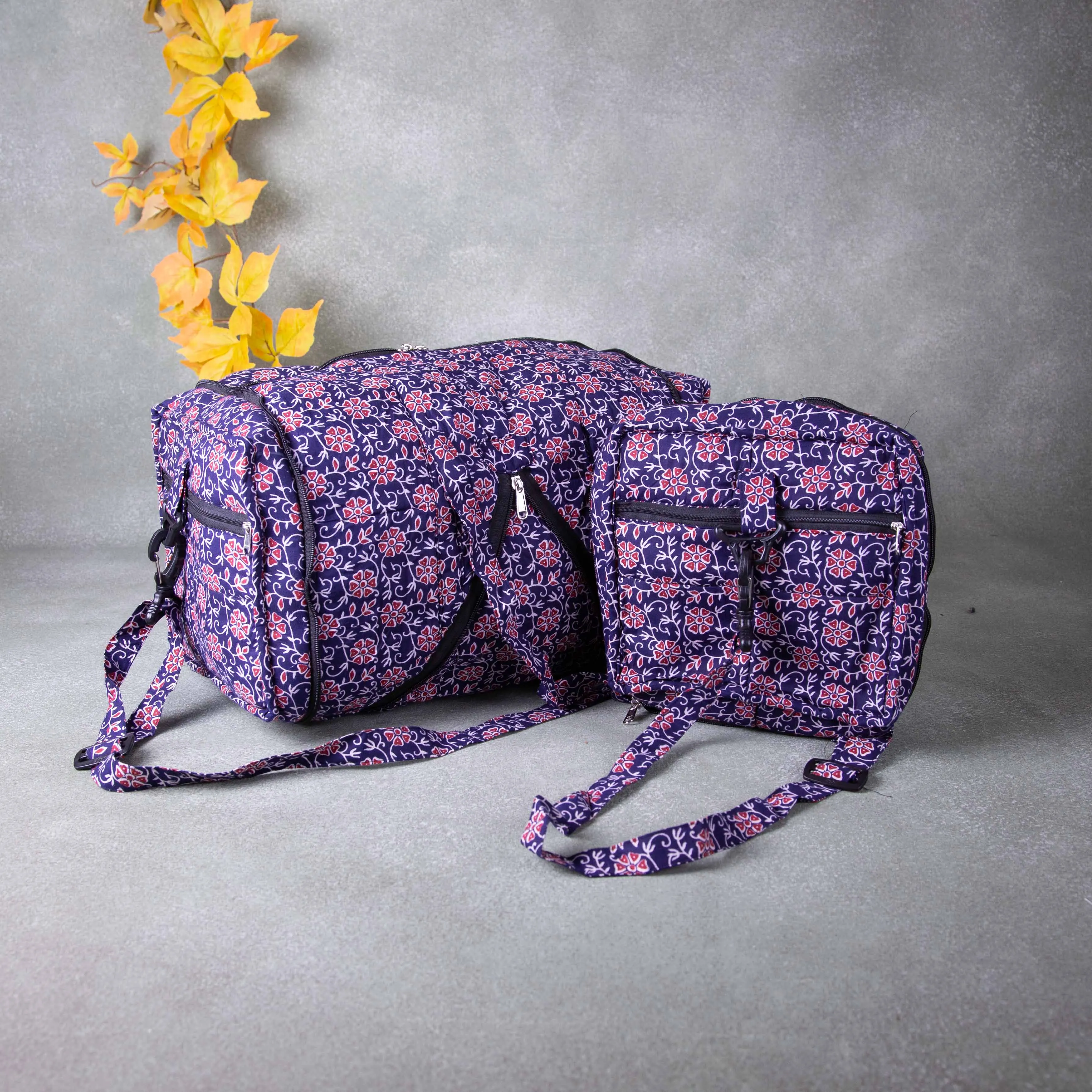 Expandable Travel Bag Purple Colour with Red and Sandal Flower Design.