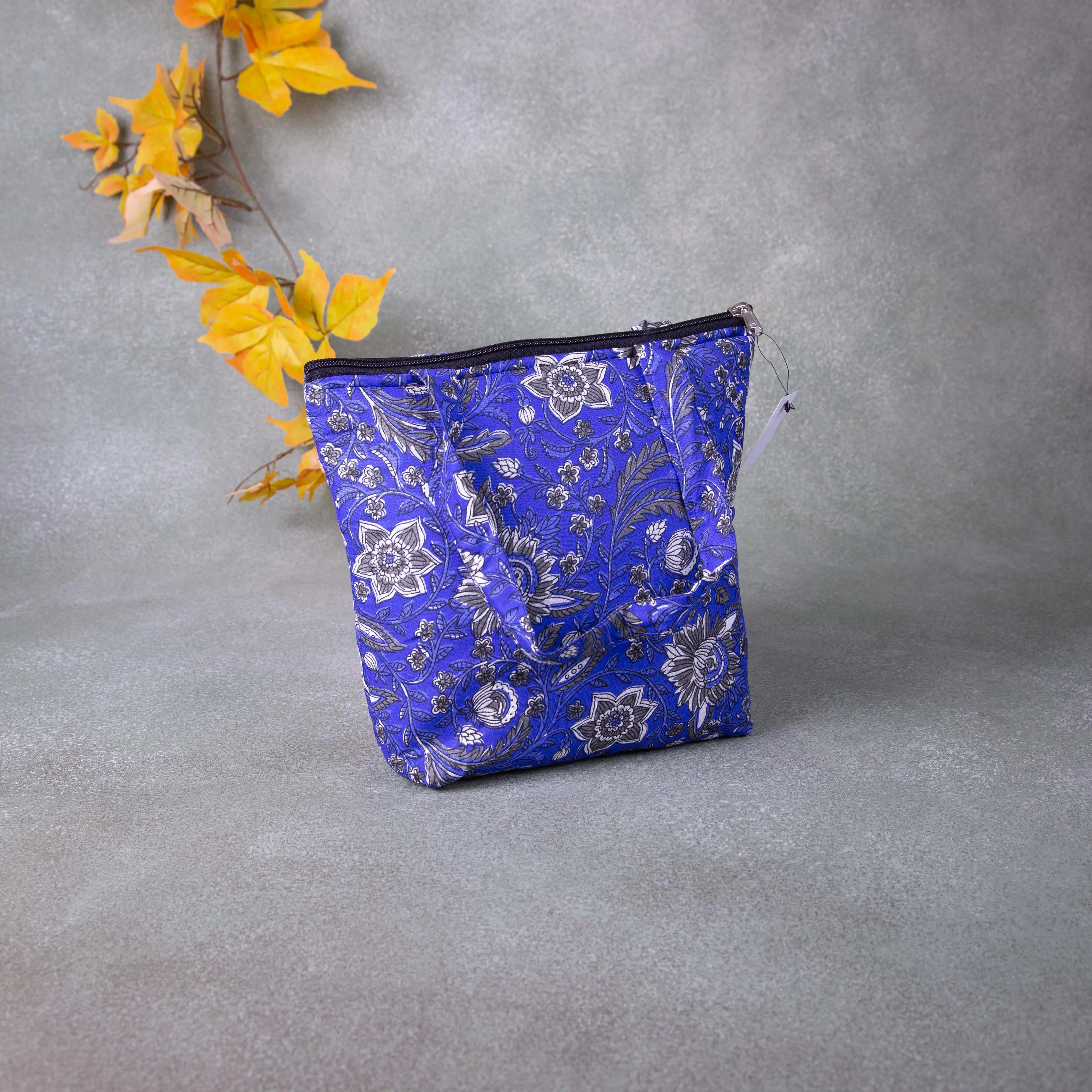 Small Handbag Blue Colour with Grey Flower Design.